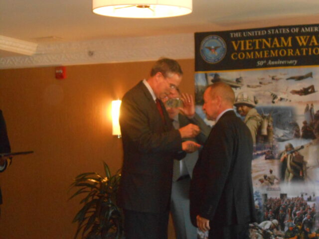 Pentagon - Dewey receiving the 50 year Vietnam commerative pin